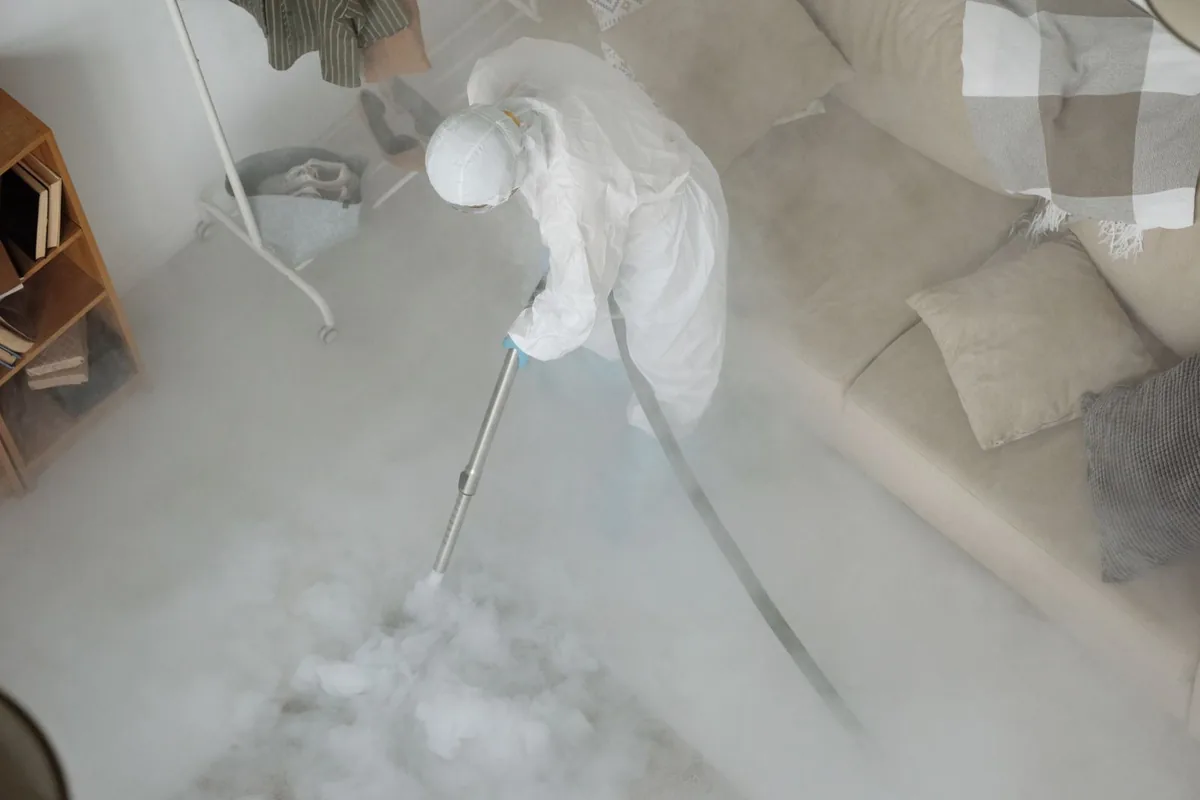Biohazard cleanup technician in protective equipment, Yamhill, OR